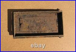 Antique cast iron door with frame for wood burning stove