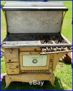 Antique gas/wood burning cook stove