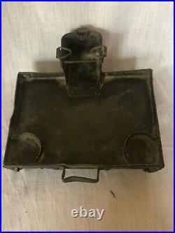 Antique traditional children toy brass stove for cooking food from burning wood