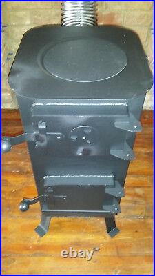 CHEAP SOLID BLACK WOODBURNING STOVE, 3 BENDS and 3 pipes 2 wall plates