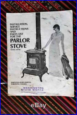 Vintage wood burning cast iron parlor stove (with original manual)