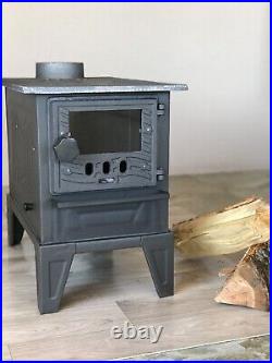 Wood and coal burning cast iron stove, camping, caravan and tent stove