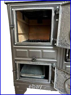 Wood stove, cooker stove, oven stove, wood burning stove, cast iron stove Wood stove, cooker stove, oven stove, wood burning stove, cast iron stove