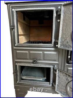 Wood stove, cooker stove, oven stove, wood burning stove, cast iron stove Wood stove, cooker stove, oven stove, wood burning stove, cast iron stove